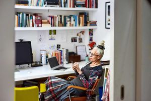 Woman in a office on phone