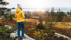 Woman looking across landscape