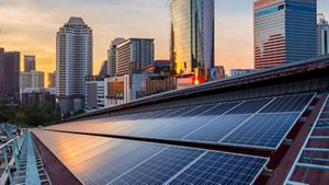 Solar panel installation on a roof of a factory