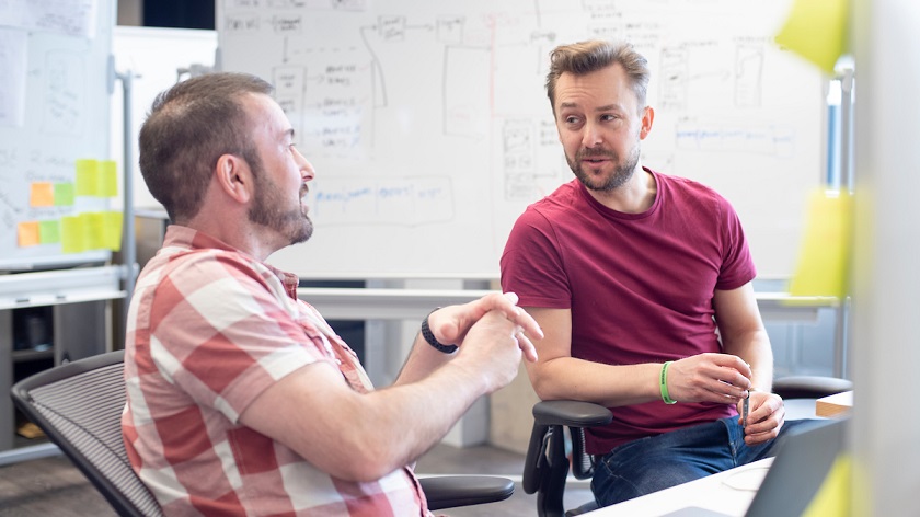 Photo of a meeting at Aviva's The Garage offices in Hoxton