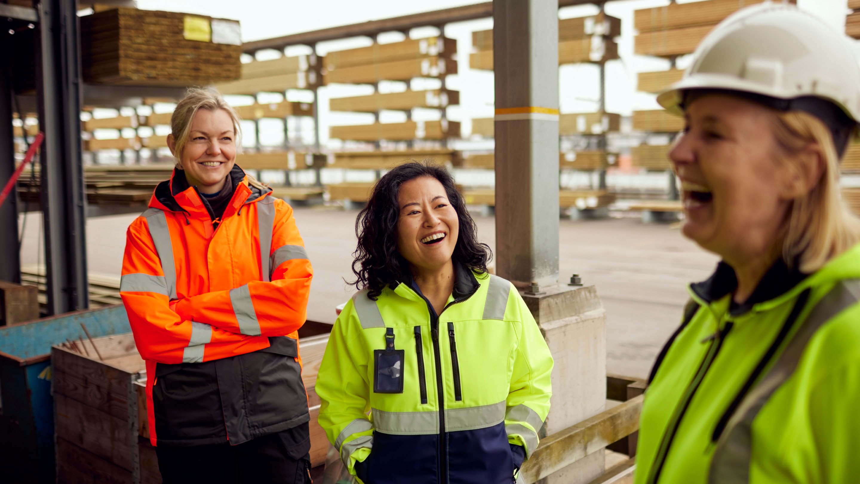 Colleagues chatting outside a warehouse
