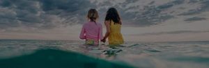 Two grils at sea