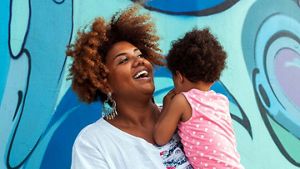 Woman holding child