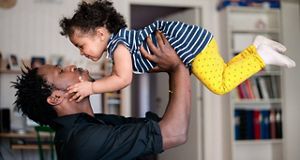 Man holding his daughter