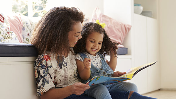 mother and daughter reading