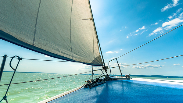 bough of a ship with a sail