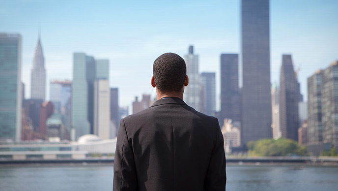 men looking at the city