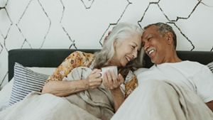 Elderly couple in bed