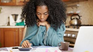 Woman looking at debt