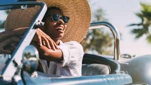 Woman driving in the sunshine
