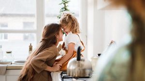 Two sisters in the kitchen