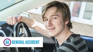 Young person behind the wheel of a car