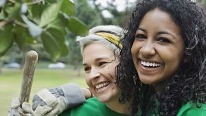 Two people smiling in the park