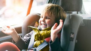 Car insurance - safetly child seatbelt on
