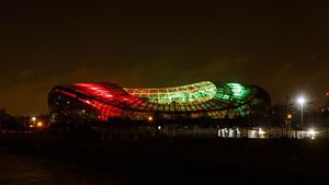 Aviva Stadium light up in the colours of the HSE