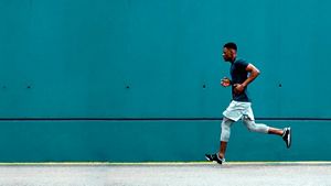 Person running along a path