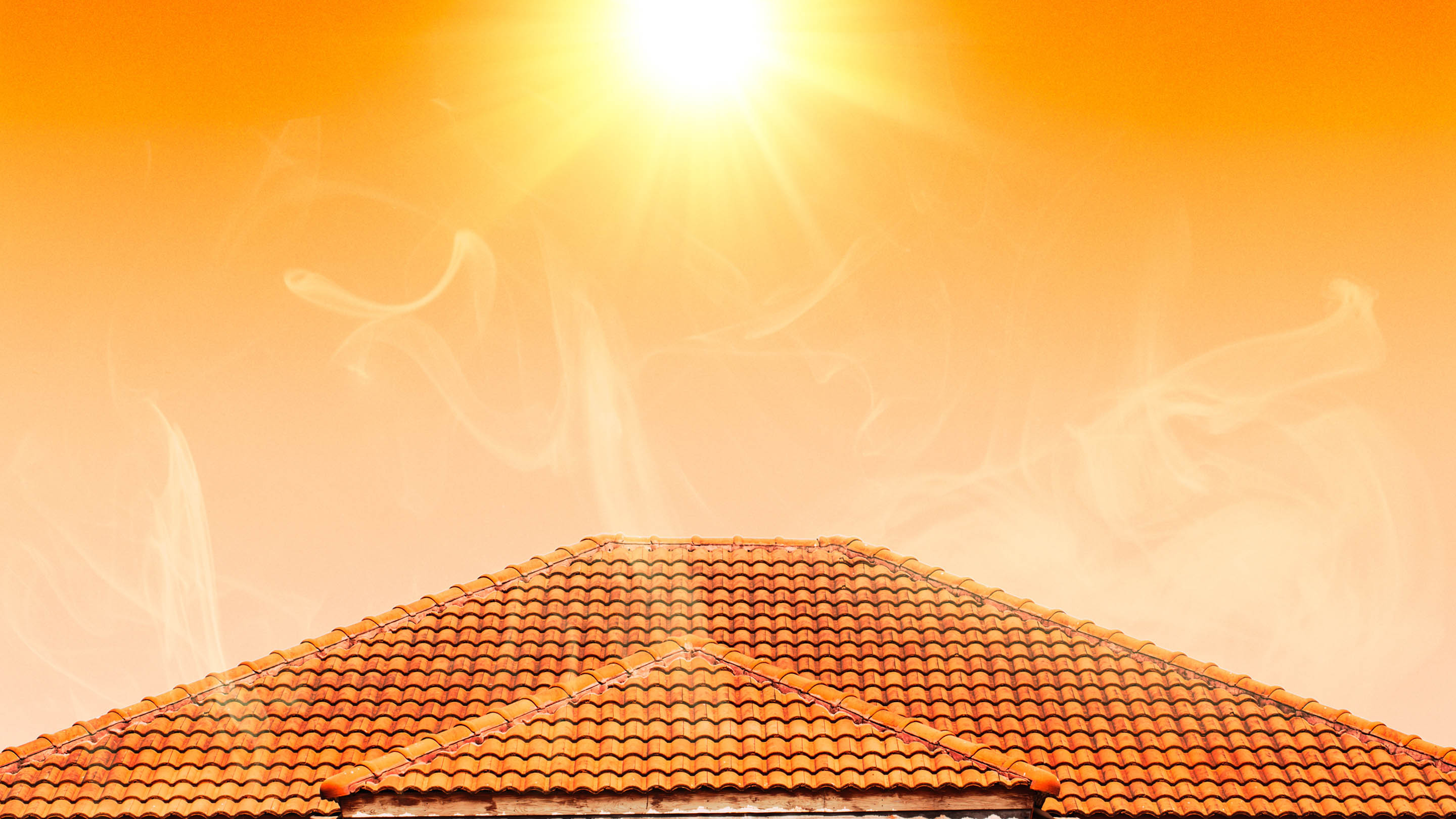 Sun with rays over a house