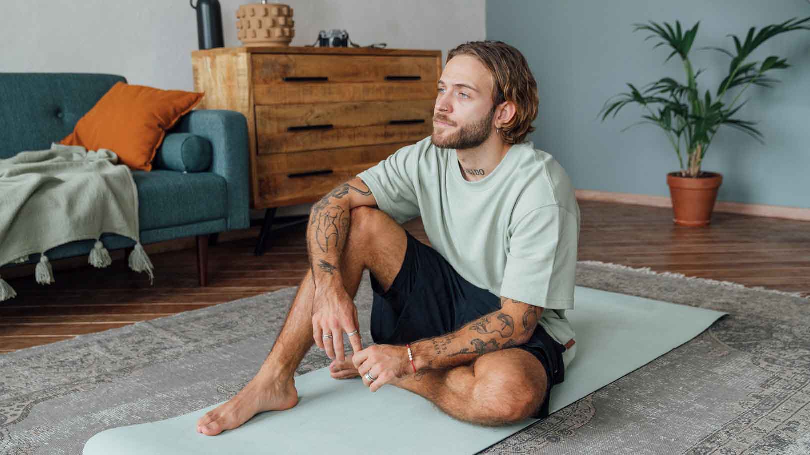 person relaxing on a carpet