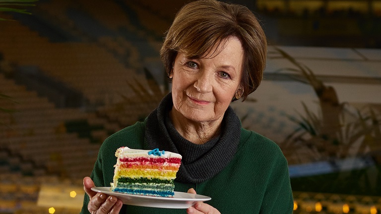 Delia Smith holding her rainbow cake in support of the Rainbow Laces campaign, which champions LGBT inclusivity in sports
