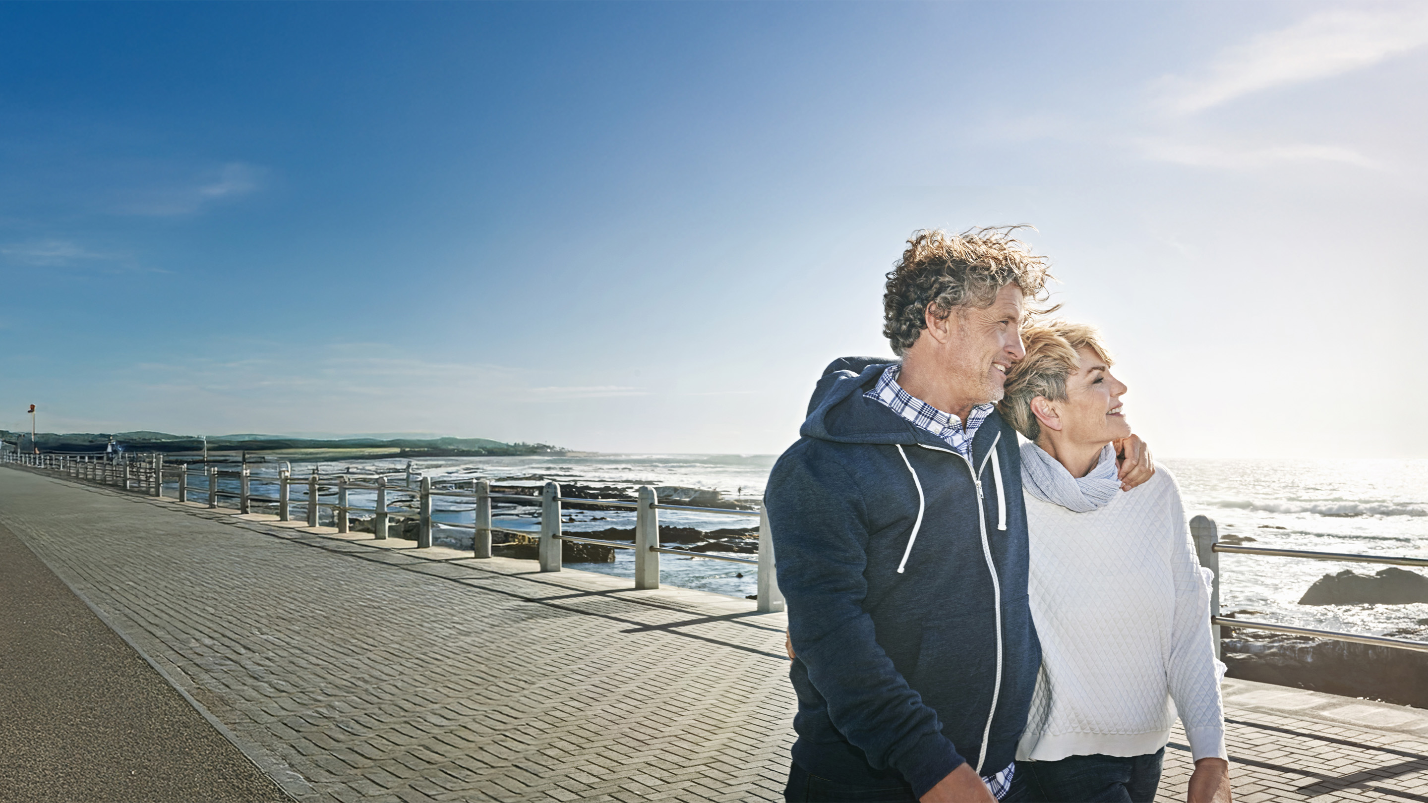 Couple walking on promenade