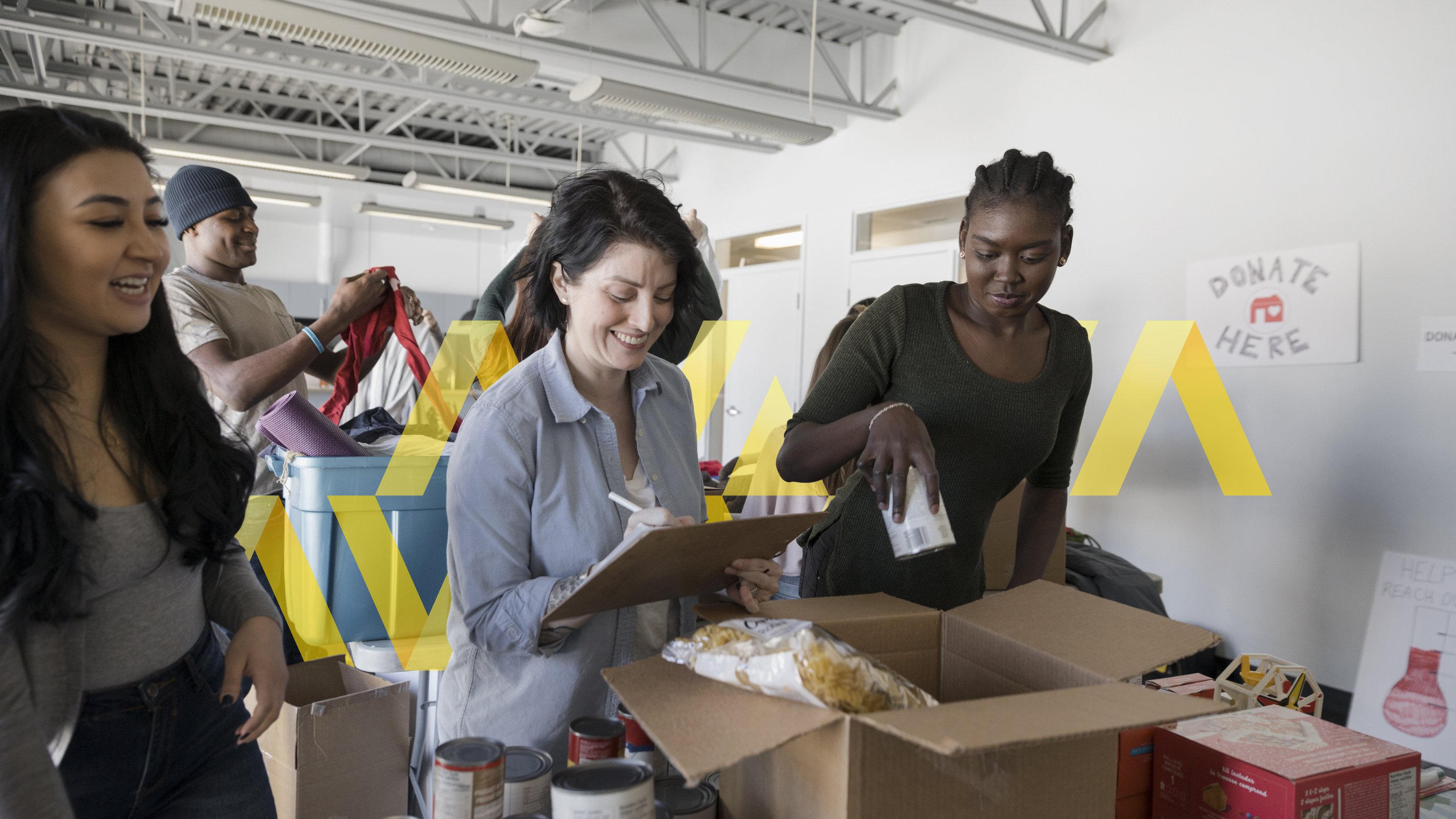 Female volunteers sorting food donations