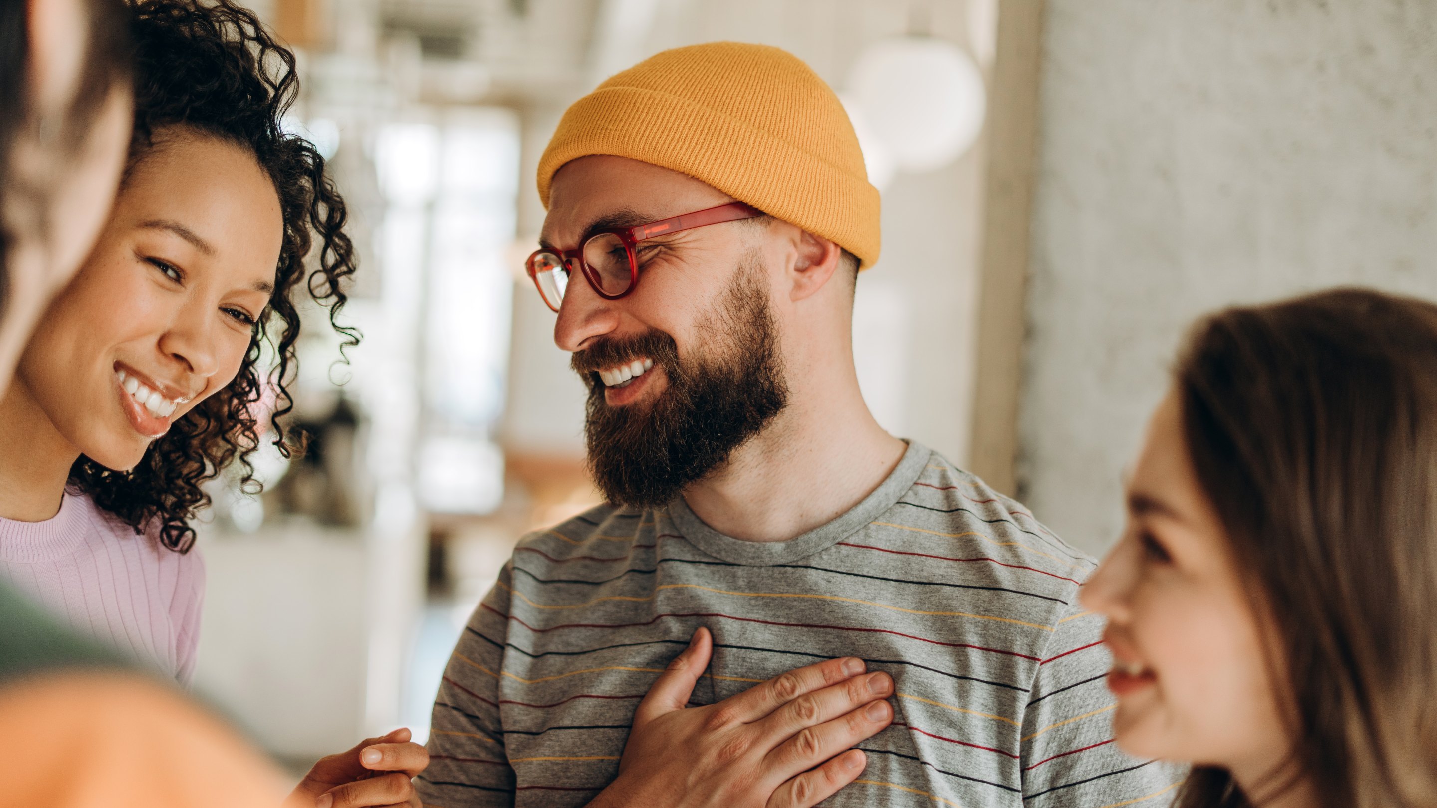 man chatting with friends