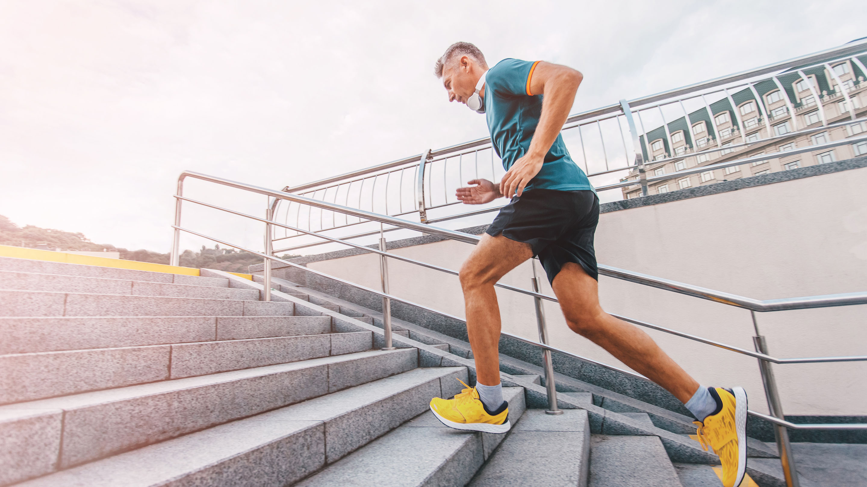 Man running up steps