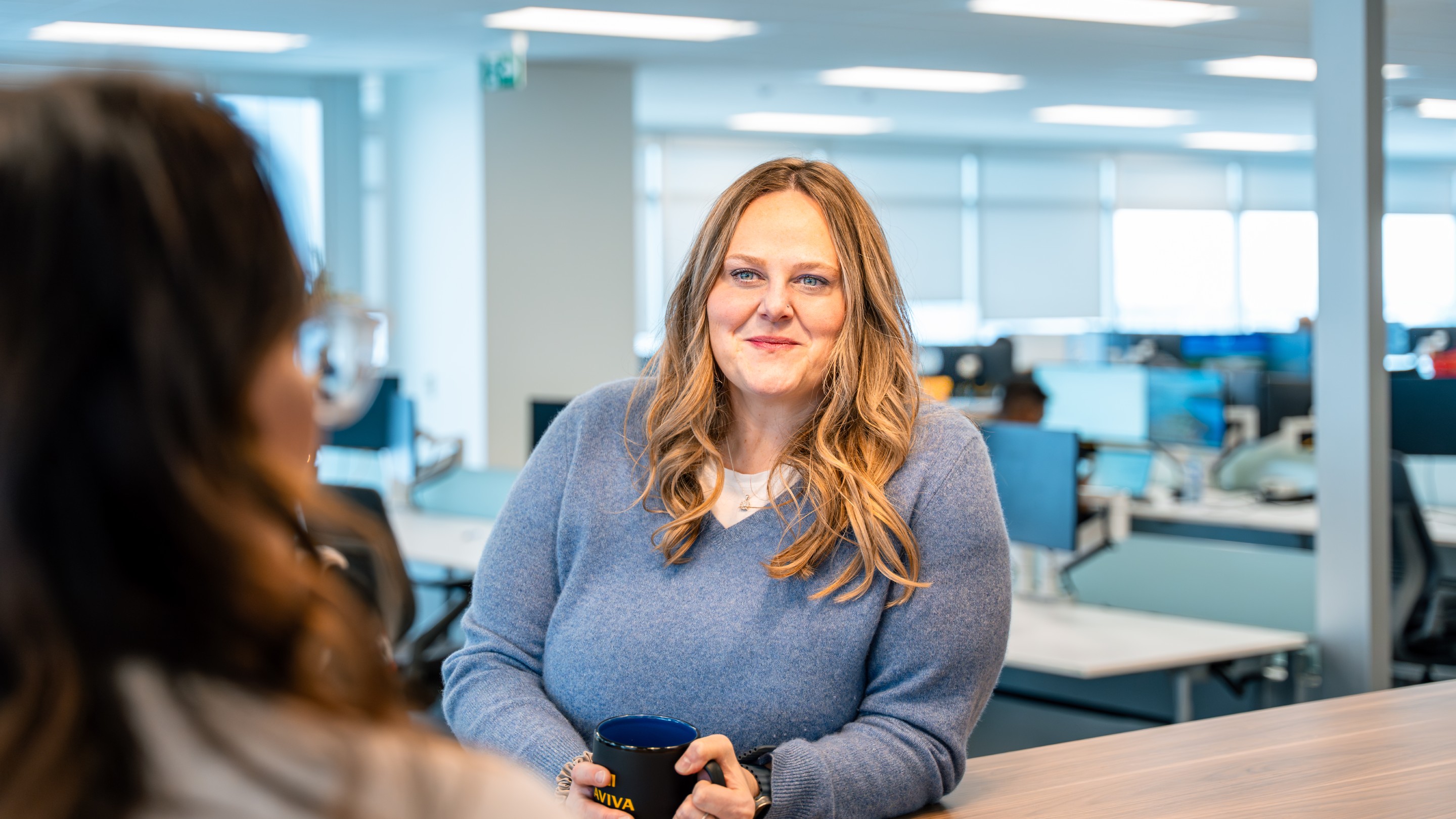 Melissa with a colleague in our Canada office