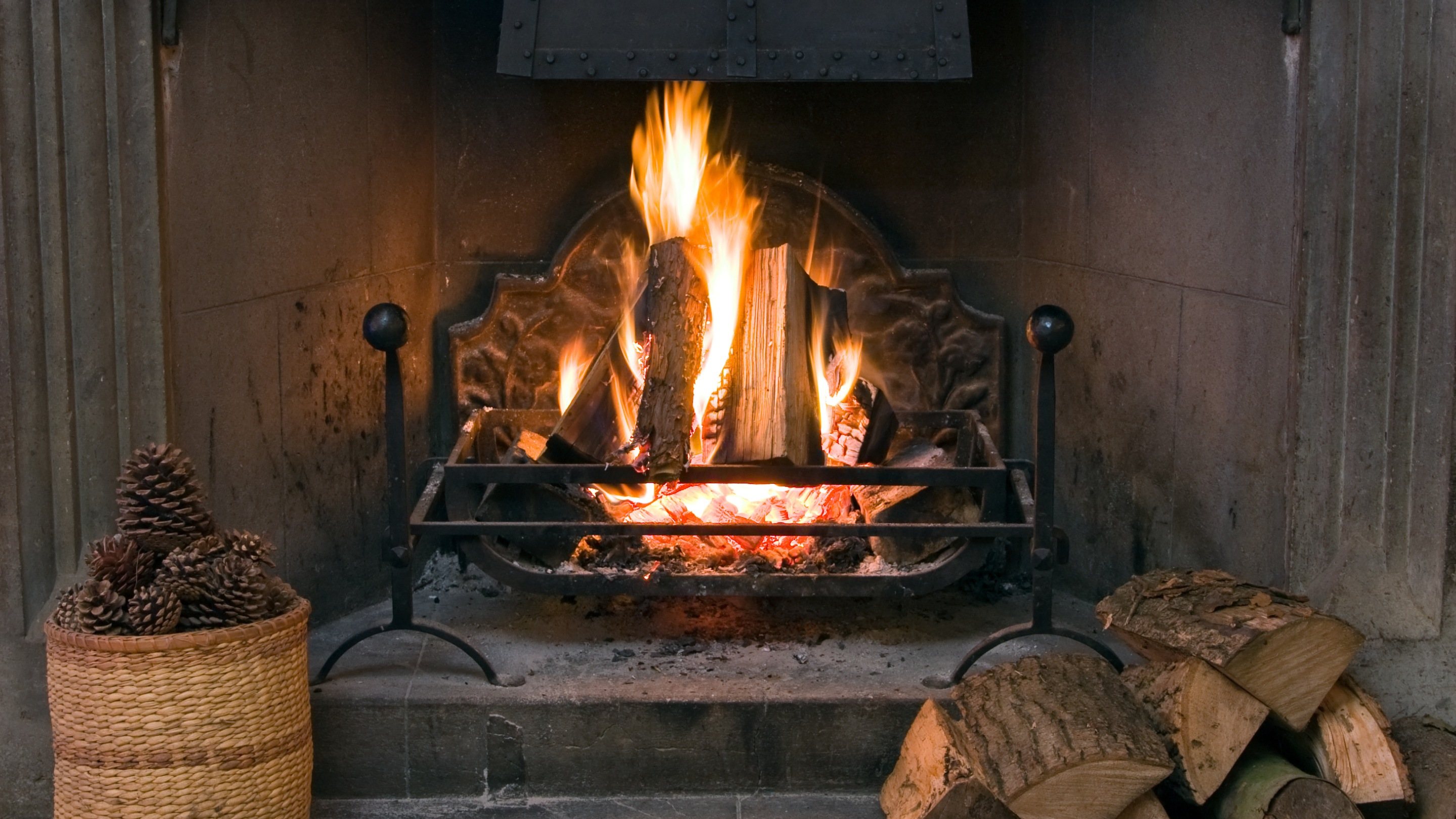 Roaring fire in stone fireplace