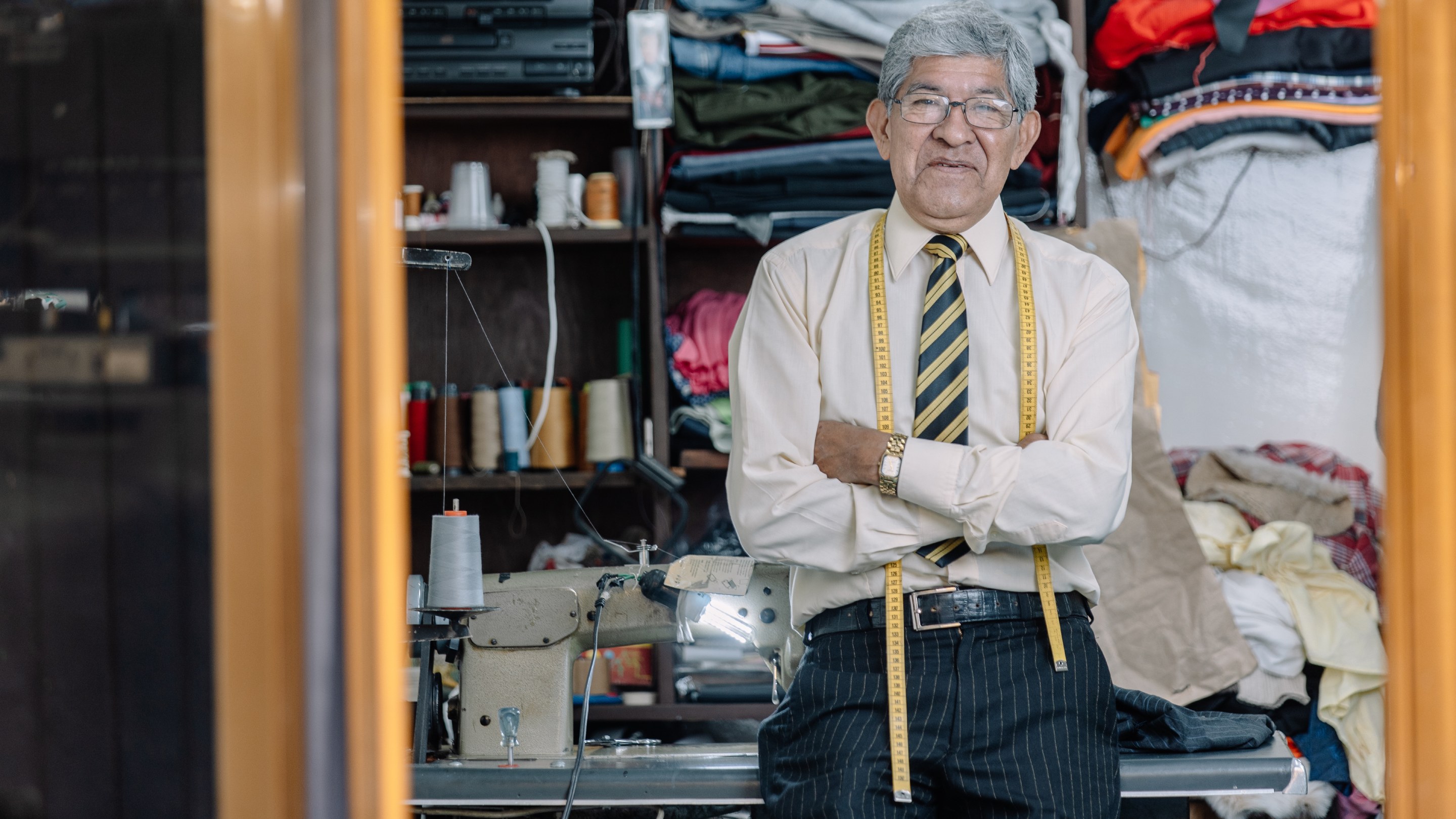 self-employed-tailor-working-at-sewing-machine