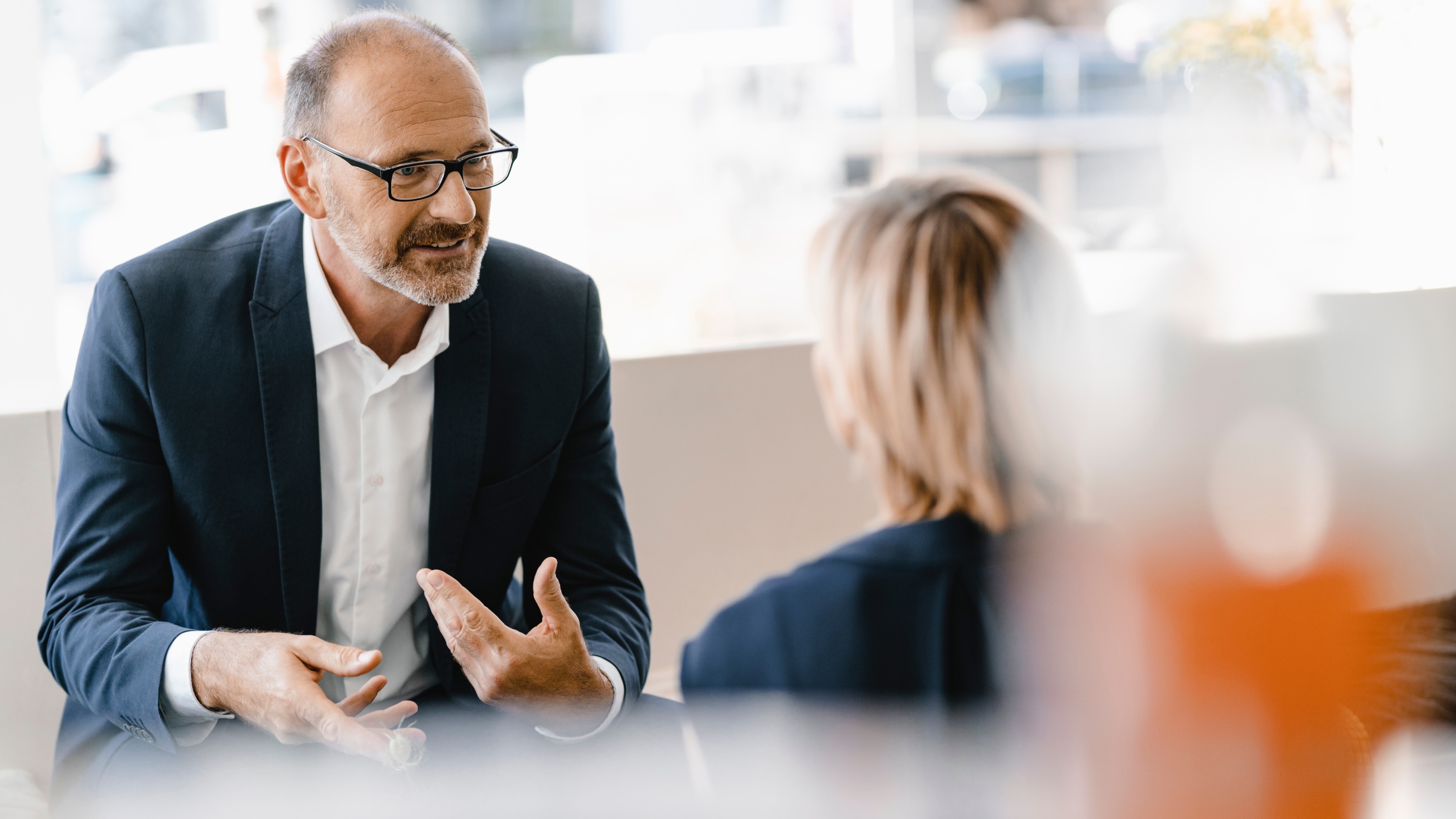 Two people having a meeting in a coffee shop