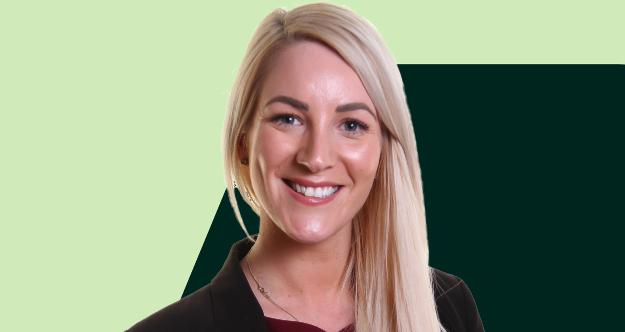 Headshot of Charlotte Nixon, female long blonde hair on two tone green background