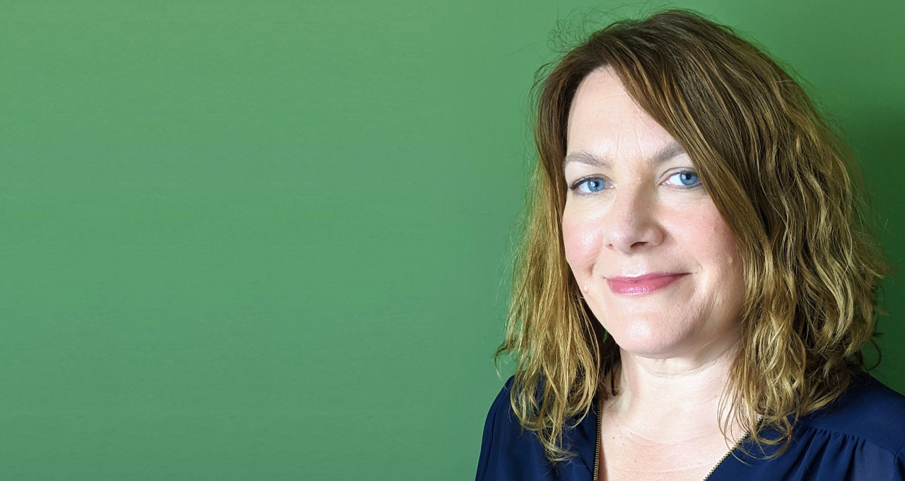 Headshot of Jaqueline Kerwood against a green background