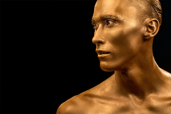 a person painted in gold