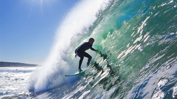 A surfer surfing on a large wave