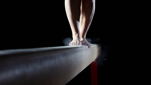 gymnast on balance beam 