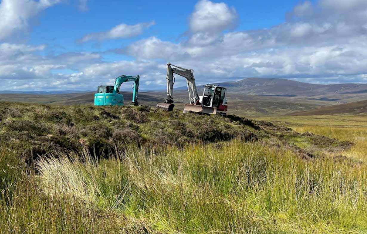Peatland restoration: Layering healthy peat over dried out vegetation, to reduce erosion