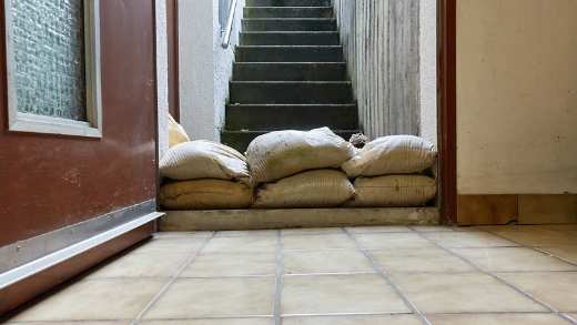 Sandbags covering the bottom of the stairs