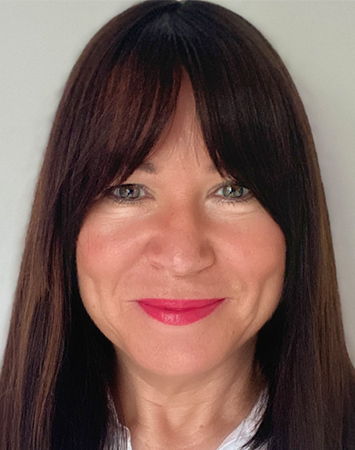 headshot portrait of a person smiling