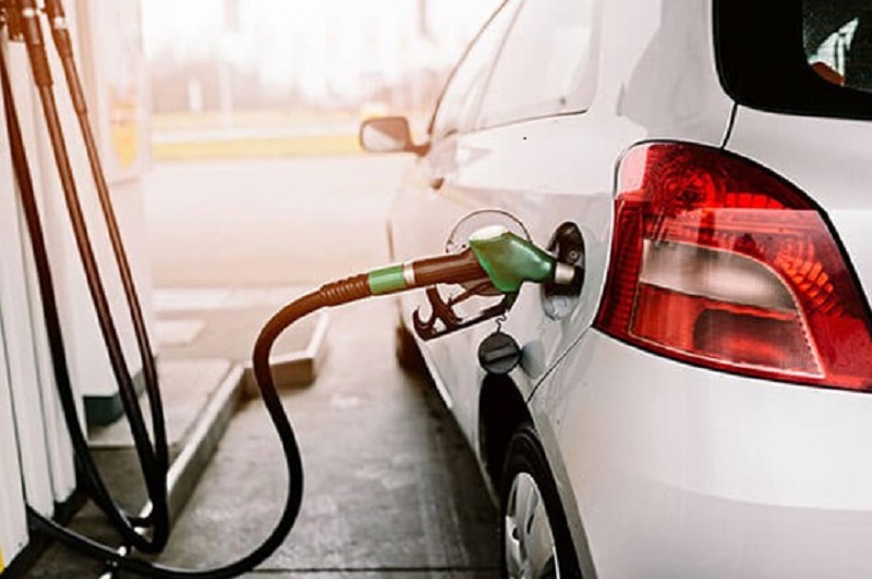 Car fuelling at garage pump