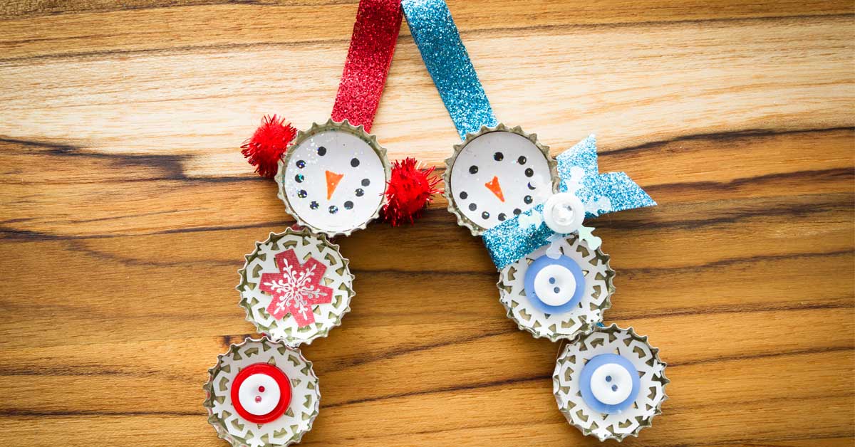 Recycled bottle cap snowmen