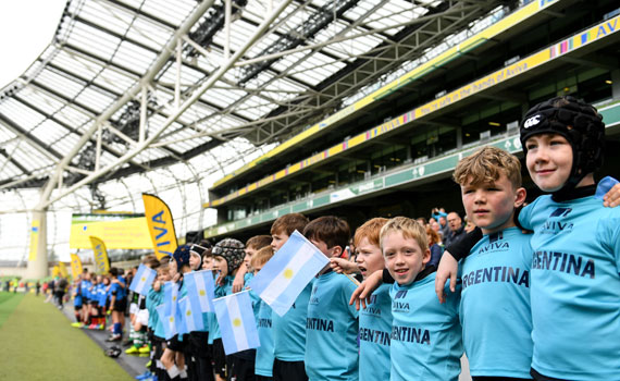 Aviva Mini Rugby Nations Cup - kids standing shoulder to shoulder