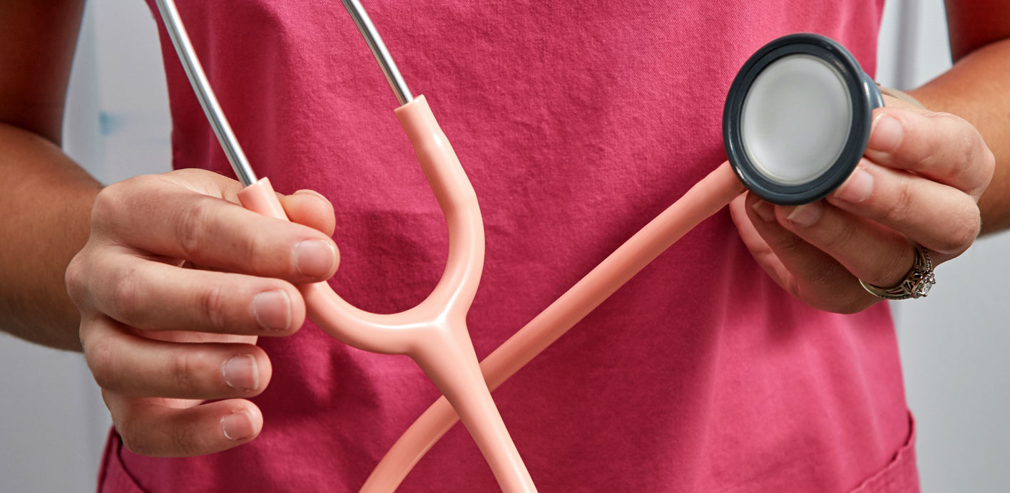 Person holding stethoscope